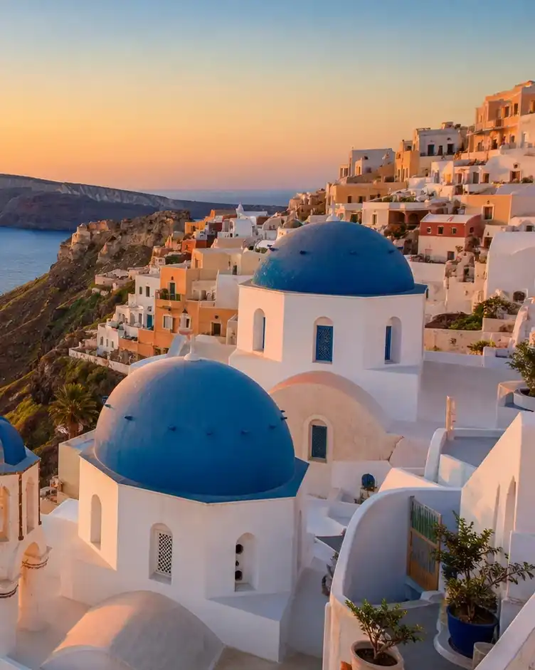 Santorini caldera view with whitewashed Cycladic buildings above the Aegean Sea