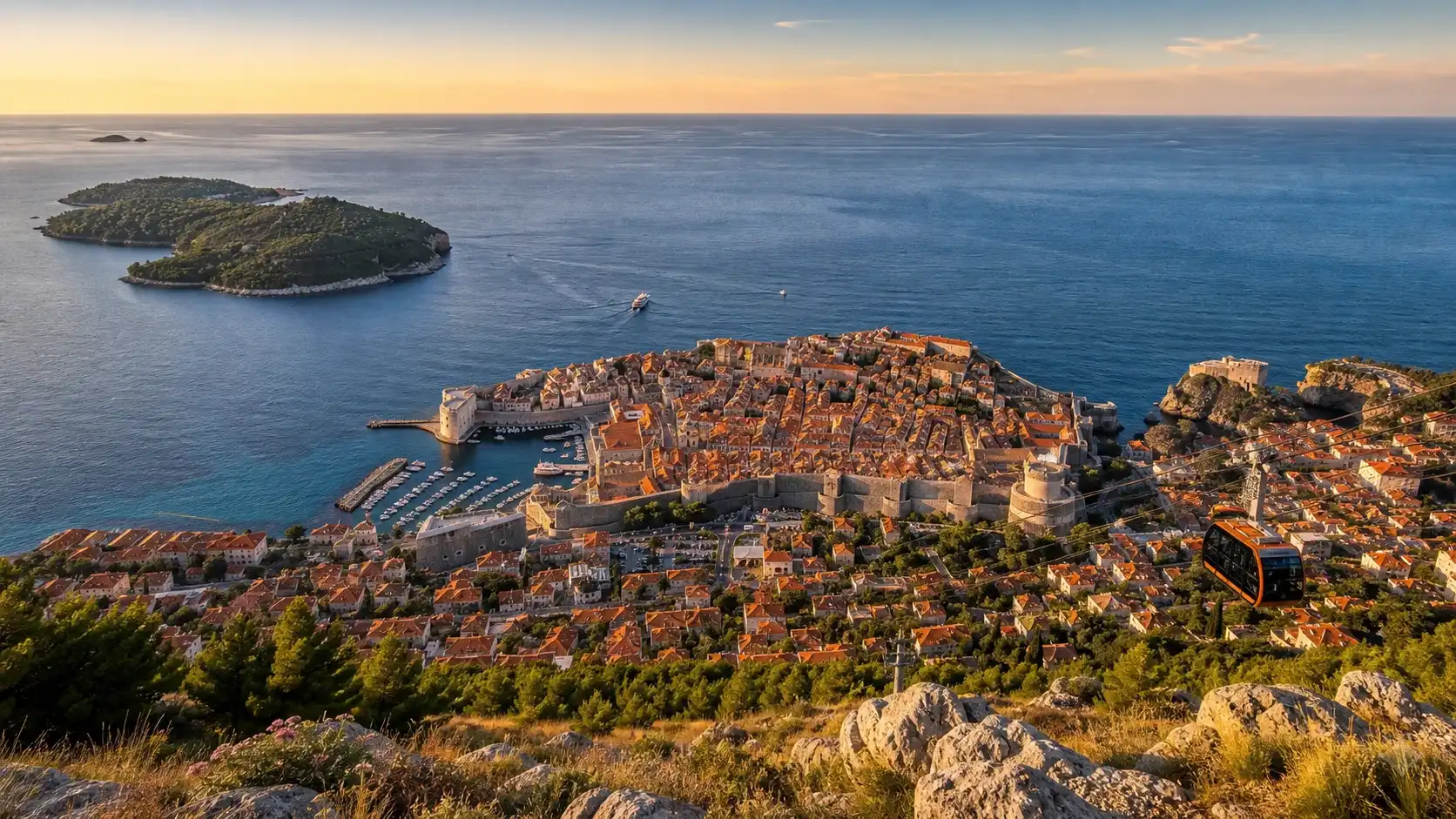 Dubrovnik Old Town and city walls from above at golden hour