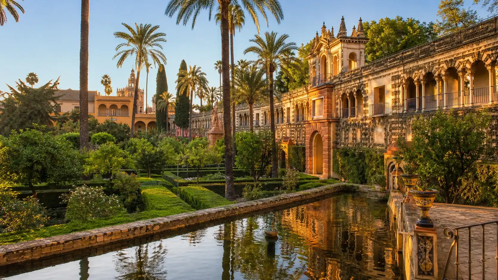 The Real Alcazar gardens in Seville at golden hour